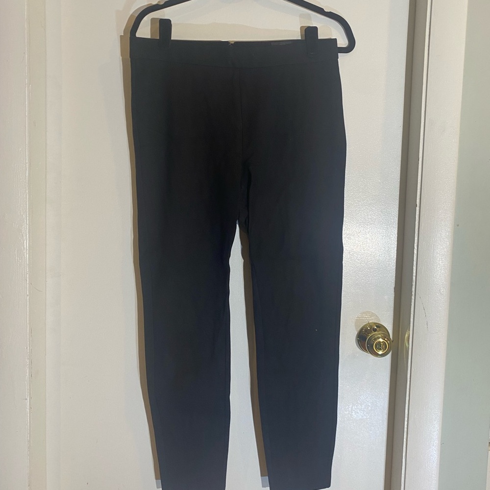 Black J. Crew Pixie leggings size L with a zipper in the back